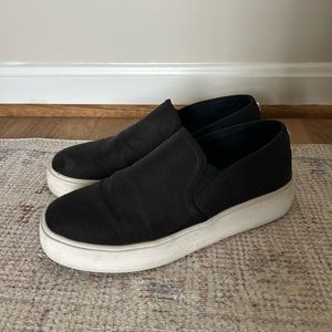 Steve Madden black slide on sneaker. Size 8.